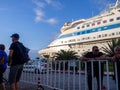 Cruise ship at the pier. Huge ship on the pier. Astoria Grande. Vacation on a cruise. At the parking lot. Expensive trip. Royalty Free Stock Photo