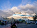 Cruise ship at the pier. Huge ship on the pier. Astoria Grande. Vacation on a cruise. At the parking lot. Expensive trip. Royalty Free Stock Photo