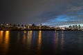 Cruise ship in the Port of Miami at sunset with multiple luxury yachts. Night view of cruise liners near Miami Port