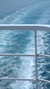 Cruise Ship Railings and Ocean Wake Royalty Free Stock Photo