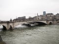 Cruise ship on the River Seine near the Notre Dame Cathedral in Paris Royalty Free Stock Photo