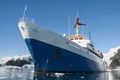 Cruise ship sailing in front of Antarctic mountains, Paradise Bay,