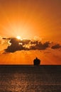 Cruise Ship Sailing into Sunset Royalty Free Stock Photo