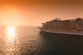 Cruise Ship Sailing into Sunset