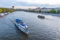 Cruise ship sails on the Moscow river in Moscow city center, popular place for walking