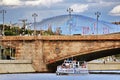 A cruise ship sails under the Big Moskvoretsky Bridge