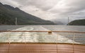 Cruise ship sails under Hardanger bridge in Norway