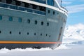 Cruise ship Seabourn Pursuit breaking through sea ice in Antarctica. Royalty Free Stock Photo