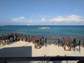 Cruise ship seen from empty beach bar cafe