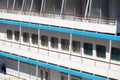 Cruise ship side view closeup as background, window and balcony Royalty Free Stock Photo