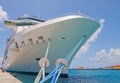 Cruise Ship Tied to Dock with Two Blue Ropes