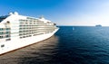 Cruise ship and a tiny yacht in mediterranean sea Royalty Free Stock Photo