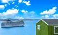 Cruise ship visit to Greenland city Qarqotoq with colored houses located near fjords and icebergs Royalty Free Stock Photo