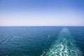 Cruise ship wake or trail on ocean surface, white trace Royalty Free Stock Photo