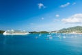 Cruise ship and yachts at seaside. Ocean liner in blue sea on sunny sky. Water transport and vessel. Travel by sea Royalty Free Stock Photo