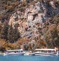 Cruise ships with Turkish flags transport tourists to the natural wonder of Mediterranean Turkey - Dalyan river