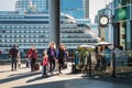 Cruise travel passengers going on board embarking ship with luggage suitcase. Tourists with their carry on luggage