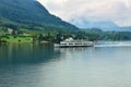 Cruise traveling in lake Lucerne. A boat traveling in the Switzerland lake.