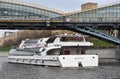 A cruise yasht of Radisson Royal sails under the bridge in Moscow Royalty Free Stock Photo