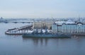 cruiser Aurora in St. Petersburg in snow and ice on the background of the city