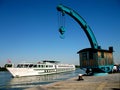 Cruiser and crane Royalty Free Stock Photo