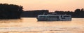 Cruiser Ship on the Danube river in the sunset