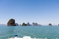 Cruising on a motorboat through the limestone islands of Phang Nga Bay, Phuket, Thailand Royalty Free Stock Photo