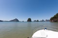 Cruising on a motorboat through the limestone islands of Phang Nga Bay, Phuket, Thailand Royalty Free Stock Photo
