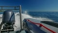 Cruising in a RIB rigid inflatable boat on a sunny day