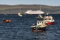 Cruising through the Scottish isles. Cruise ship at anchor at Portree, Scotland.