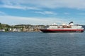 Cruising ship Nordkapp of Hurtigruten cruising to port in Kristiansund in Norway