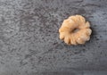 Cruller shaped donut on a gray background Royalty Free Stock Photo
