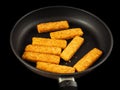 Crumbed Fish Fingers In Fry Pan