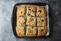 Crumble fruit pie. Homemade sweet pie slices in baking pan. Top view