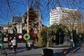 Fenced off rubble of partially destroyed historic Christchurch Cathedral supported by steel frame seismic bracing in New Zealand