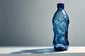 A crumbled plastic water bottle with an isolated background Royalty Free Stock Photo