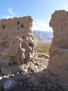 Crumbled remains of walls of Tashkurgan Taxkorgan Stone Fort overlooking the Jincaotan Grasslands Wetlands, Xinjiang Royalty Free Stock Photo