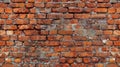 Crumbling Brick Wall With Extensive Cracks and Weathering