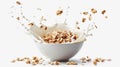 Crumbling crispy muesli, a bowl of oatmeal granola with splashes of milk, highlighted