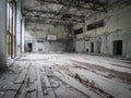 Crumbling and disintegrated school gym, deserted building in Chernobyl radiation zone, Ukraine