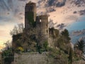 Crumbling m abandoned castle in a meadow in italy Royalty Free Stock Photo