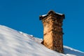 Crumbling old brick chimney on old abandoned house Royalty Free Stock Photo