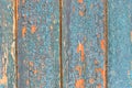 Crumbling paint on old boards wooden door