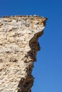Crumbling rock wall in ghost town (Kayakoy), Turkey