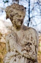 Crumbling statue of a beautiful woman