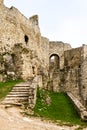 Crumbling Stone Steps and Exterior Castle Walls