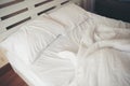 Crumpled bed in the bedroom Royalty Free Stock Photo