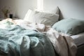 Crumpled bed on the bed in the bedroom in the morning. Royalty Free Stock Photo