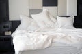 Dirty bed in the hotel. Dirty bed pillow blanket room Royalty Free Stock Photo