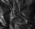 Crumpled black paper, background Royalty Free Stock Photo